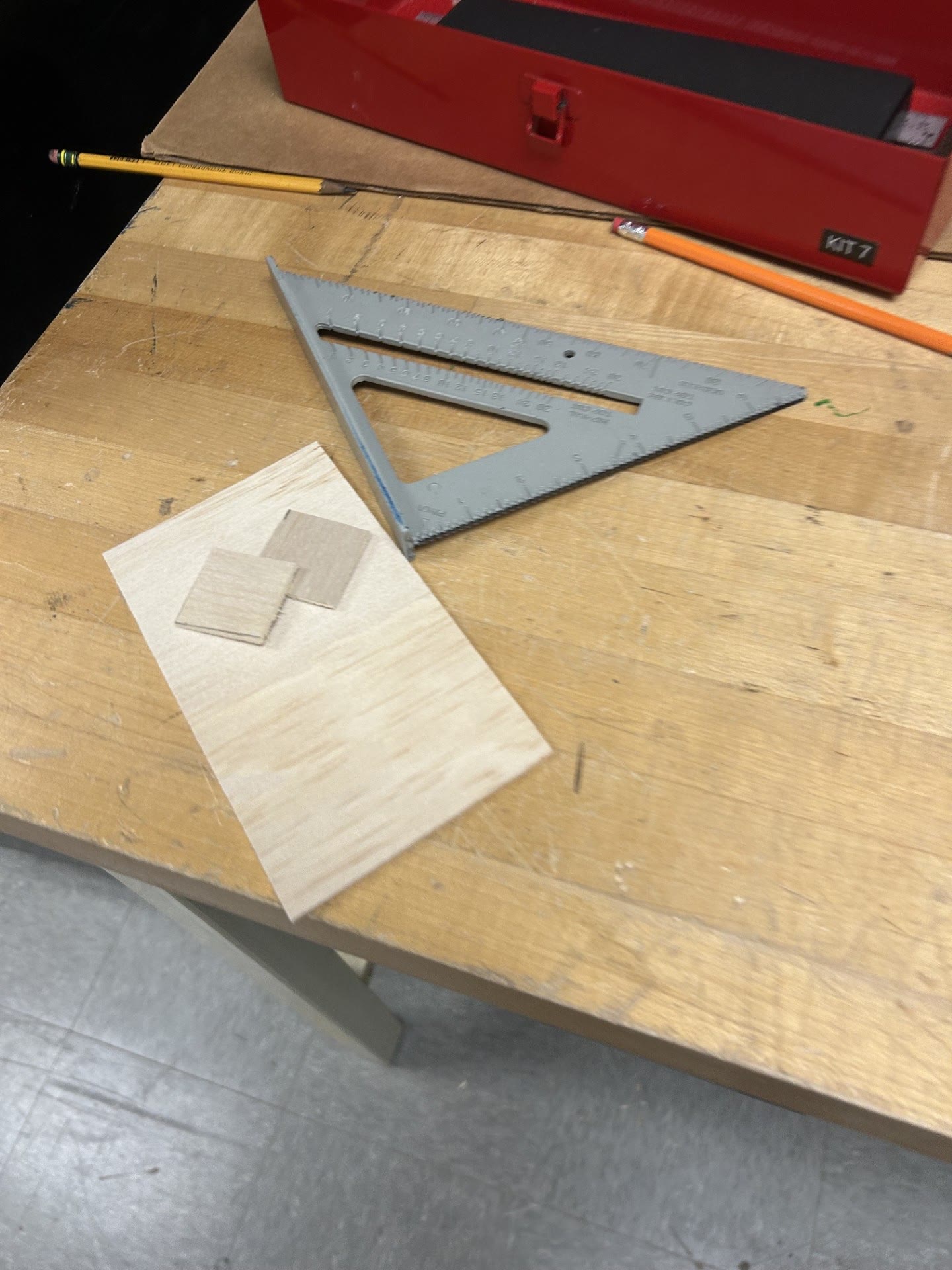 Laying out plywood parts with a square